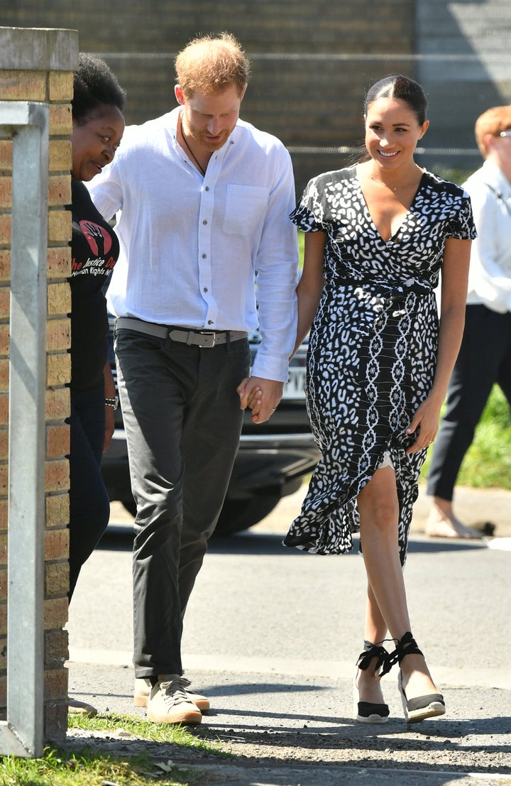 The Duke and Duchess of Sussex arrive at the Nyanga Township in Cape Town, South Africa, for a visit to a workshop that teaches children about their rights, self-awareness and safety, on the first day of their tour of Africa. 