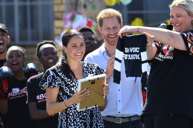 The Duke and Duchess of Sussex are presented with a gift for son Archie. 