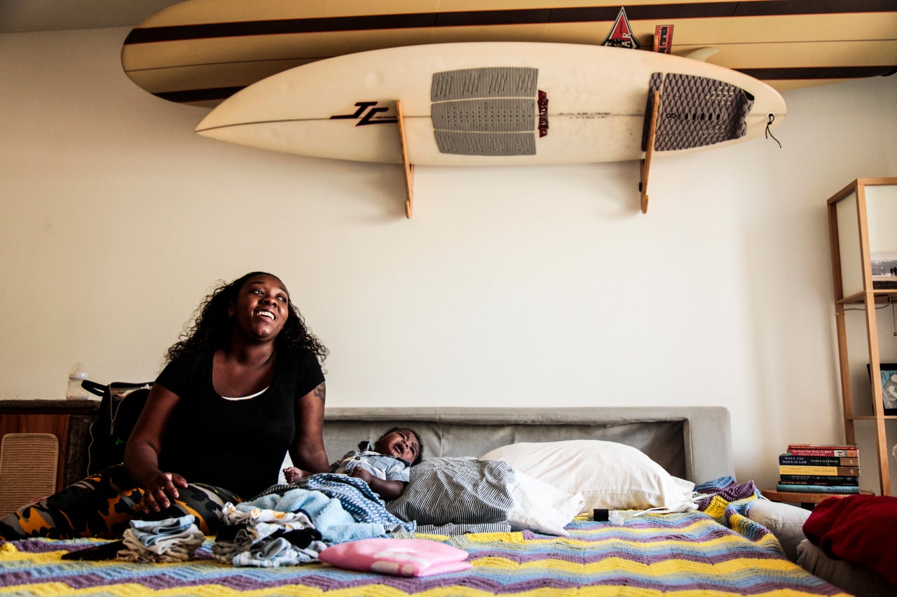 Natandra Lewis her newborn Chandler escaped Hurricane Dorians storm surge and are lucky to have clean water and restful nights in West Palm Beach after arriving from Freeport, Grand Bahama Wednesday morning, September 18, 2019.