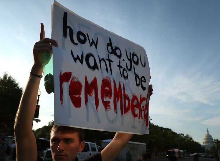 Climate change protesters block traffic during a protest to shut down Washington, D.C., on Sept. 23, 2019.