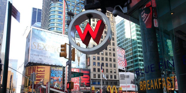 A sign for the W Hotel is shown in New York's Times Square, Thursday, April 29, 2010 in New York. Starwood Hotels & Resorts Worldwide Inc., the owner of the Sheraton, W, Westin and other hotel brands, said hotel demand rose in the first quarter, particularly at its luxury brands, pushing its first-quarter profit sharply higher. (AP Photo/Mark Lennihan)