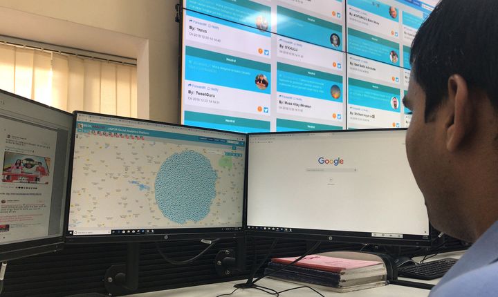 An officer looks at computer screens inside a police war room setup to monitor social media posts in Jaipur in Rajasthan, December 3, 2018. Picture taken December 3, 2018. 
