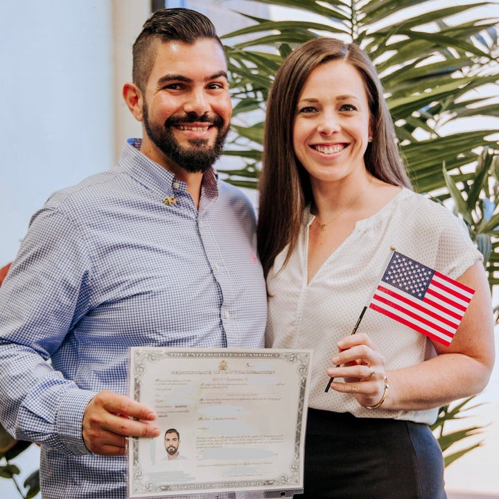 Tiago and the author on the day he was naturalized as a U.S. citizen.