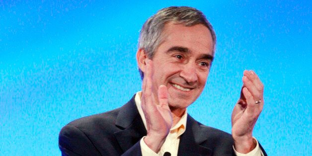 Patrick Pichette, chief financial office of Google, claps after an announcement at in Kansas City, Kan., Wednesday, March 30, 2011. After seeing Facebook pleas and flash mobs, and even cities temporarily renaming themselves