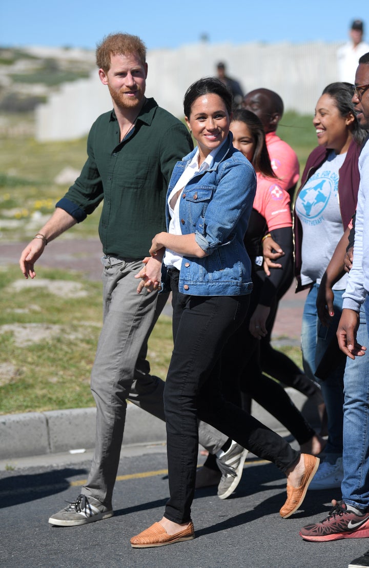 Harry and Meghan chatted with participants of Waves of Change, a nonprofit that offers surf therapy.