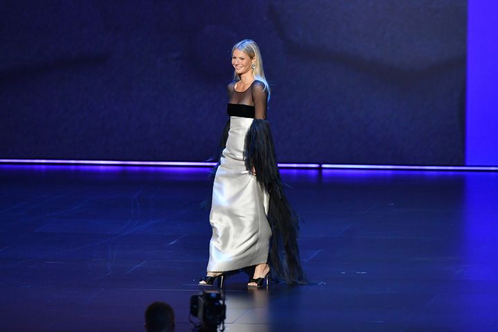 Paltrow walks across the stage as Stevie Wonder's “Superstition” blares in the background.