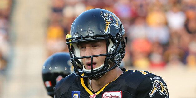 HAMILTON, CANADA - JULY 31: Samuel Giguere #11 of the Hamilton Tiger-Cats during CFL game action against the Winnipeg Blue Bombers on July 31, 2014 at Ron Joyce Stadium in Hamilton, Ontario, Canada. (Photo by Tom Szczerbowski/Getty Images)