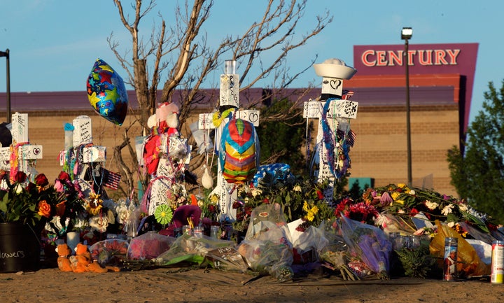 In this July 27, 2012, file photo, crosses honor of the victims of the Aurora, Colorado, movie theater shooting. The gunman was convicted of murder and attempted murder and sentenced to life in prison without parole.