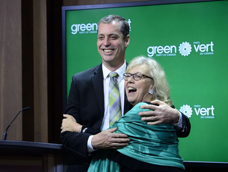 Green Party of Canada leader Elizabeth May introduces newly elected Green MP, Paul Manly, during a press conference on Parliament Hill on May 10, 2019.