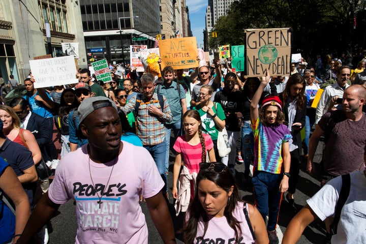 Swedish environmental activist Greta Thunberg, center, takes part during the Climate Strike, on Sept. 20, 2019 in New York.&n