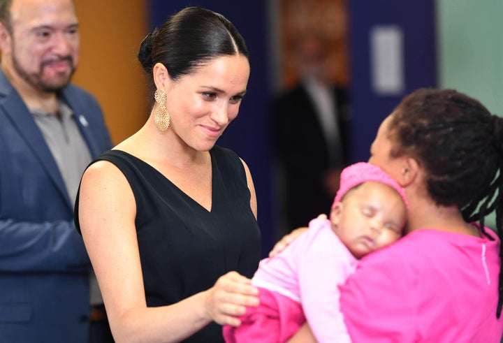 Meghan meets with 7-week-old Sumeya as she visits mothers2mothers. The group is an African not-for-profit organization with the vision of a healthy, HIV-free Africa.