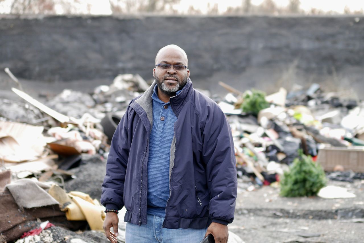 The Rev. Michael Malcom leads a faith-based environmental group and brings people to the Superfund site to see how residents of North Birmingham live.