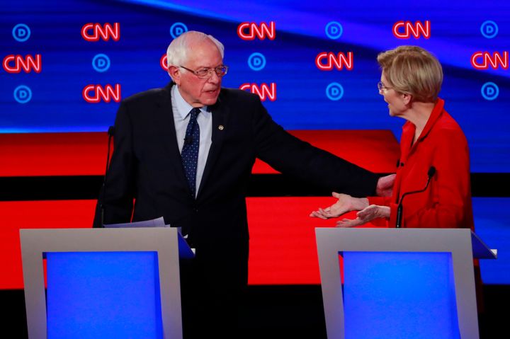 Bernie Sanders, left, greets Elizabeth Warren at the July 30 debate in Detroit, Michigan. The two candidates reportedly had a