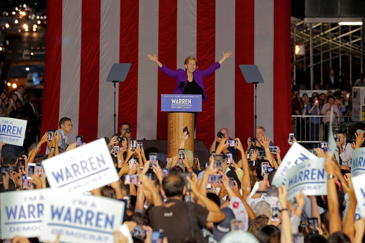 Warren speaks to thousands of rallygoers in Manhattan on Sept. 16. Her ascent in the polls appears to have prompted more aggressive pushback from Sanders' team.