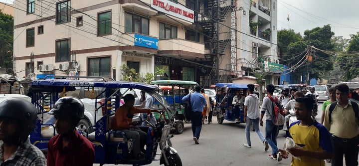 E_rickshaws driving haphazardly in Patel Nagar, New Delhi 