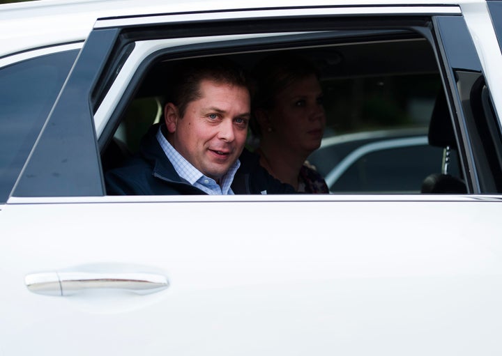 Federal Conservative Leader Andrew Scheer arrives in a car before making a campaign stop in Quebec City on Sept. 25, 2019.