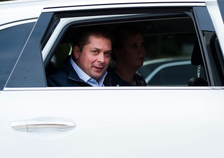Federal Conservative Leader Andrew Scheer arrives in a car before making a campaign stop in Quebec City on Sept. 25, 2019. 