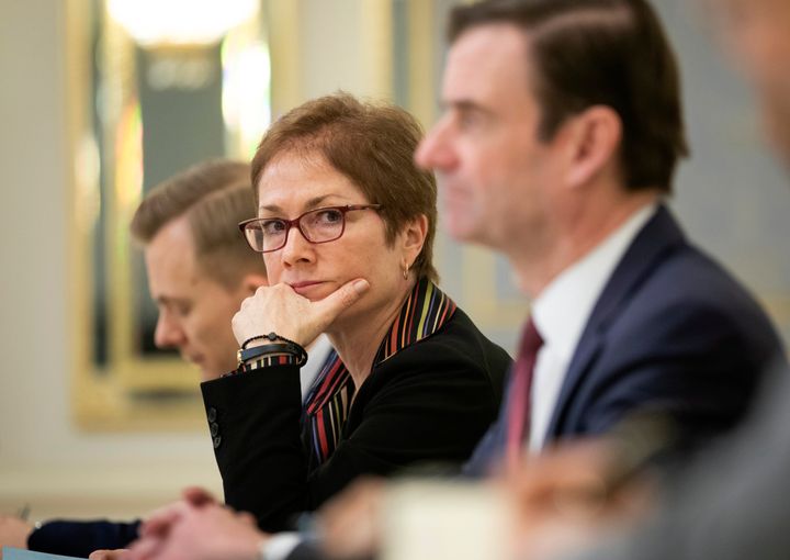 U.S. Ambassador to Ukraine Marie Yovanovitch, center, sits during a meeting with Ukrainian President Petro Poroshenko in Kiev, Ukraine, March 6, 2019.