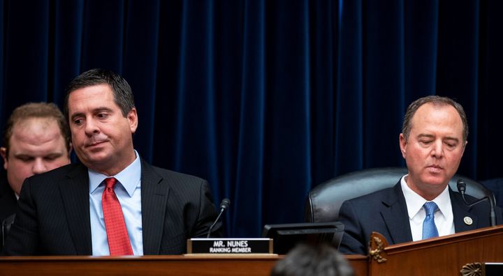 House Intelligence Committee Chairman Adam Schiff (D-Calif.) reacts after conferring with Ranking Member Devin Nunes (R-Calif.) as Joseph Maguire, the acting director of national intelligence, testifies Thursday.