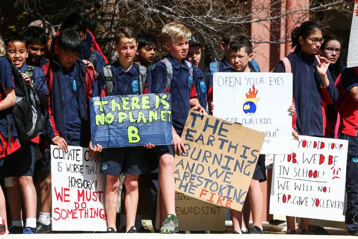 Protestors raise climate change awareness in New Zealand's capital, Wellington.