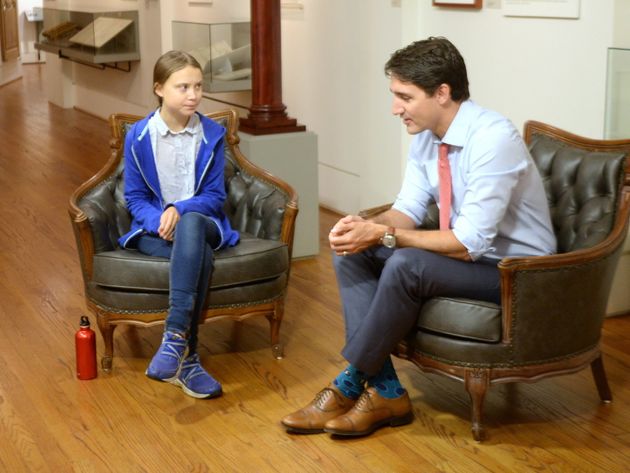 Liberal Leader Justin Trudeau speaks with Swedish climate activist Greta Thunberg in Montreal on
