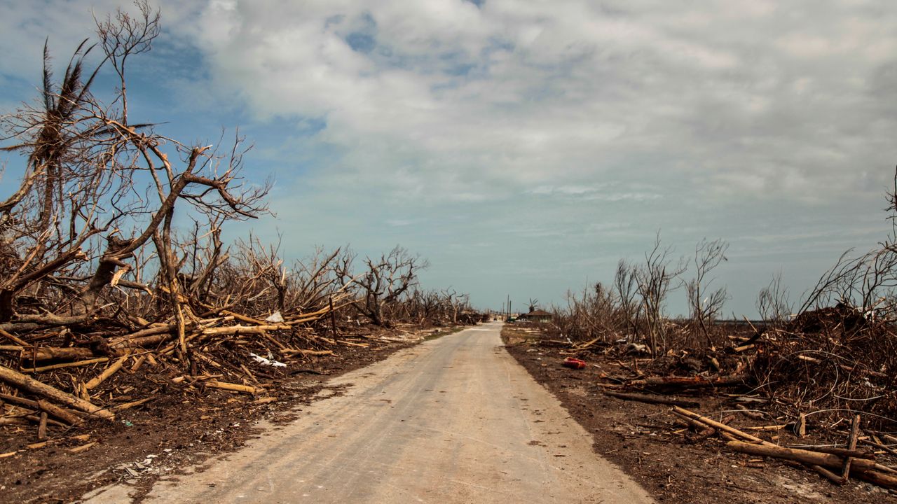 Debris from Hurricane Dorian covers both sides of the main road on the east end of Grand Bahama Island on Sept. 22, 2019.