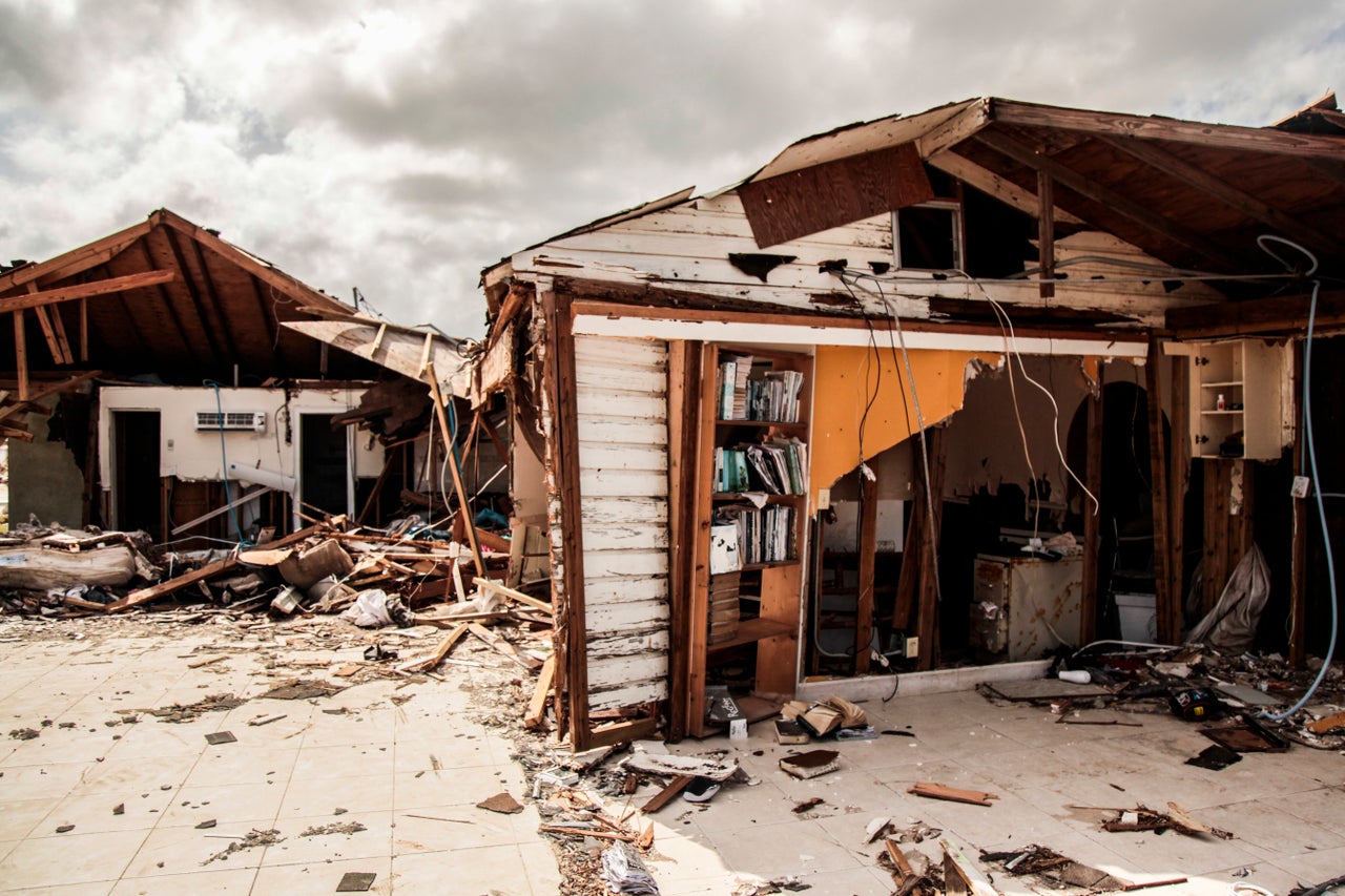 A bookshelf was one of the last things that remained intact at this home in Pelican Point, Grand Bahama, after Hurricane Dorian.