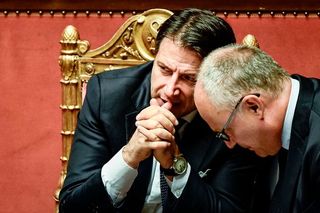 Italy's Prime Minister Giuseppe Conte (L) and Italy's Finance and Economy Minister Roberto Gualtieri...