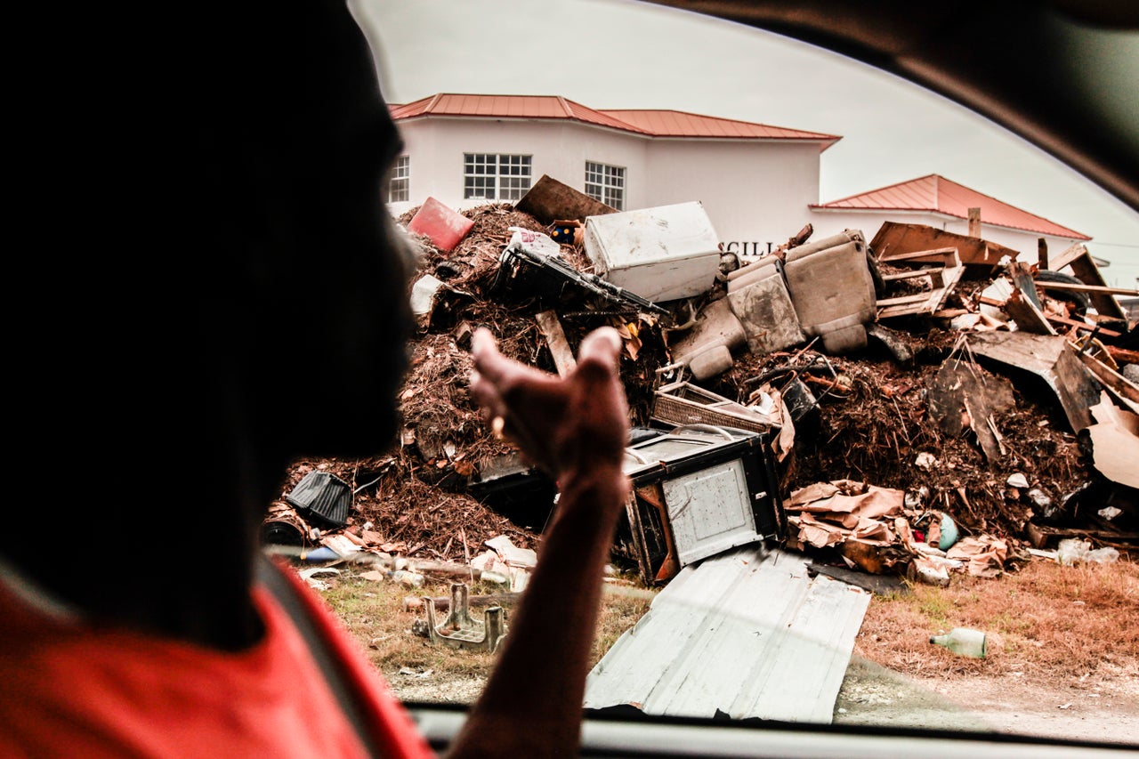 Debris and furniture piled outside of businesses and homes in Freeport, Grand Bahama on Sept. 21, 2019.