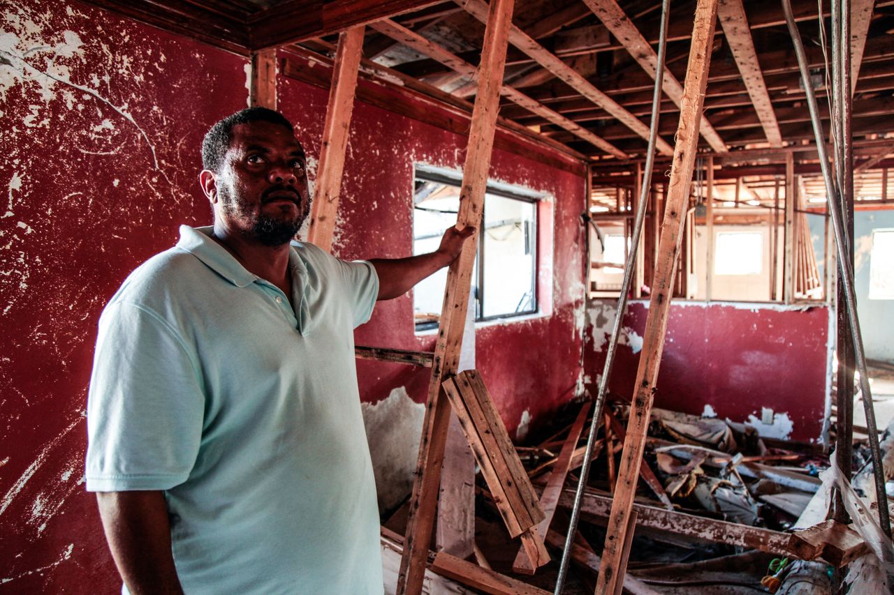 Pastor Raymond Simozne stands in his demolished home in Freeport, Grand Bahama on Sept. 24, 2019.