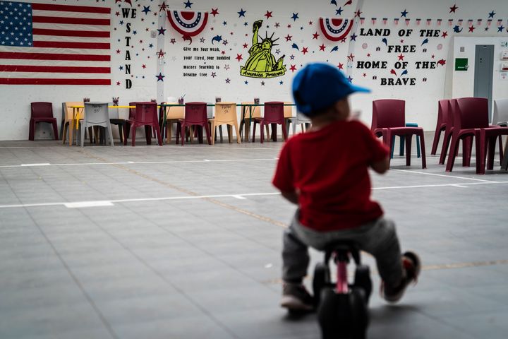 An immigrant child plays at the South Texas Family Residential Center, which houses immigrant families.