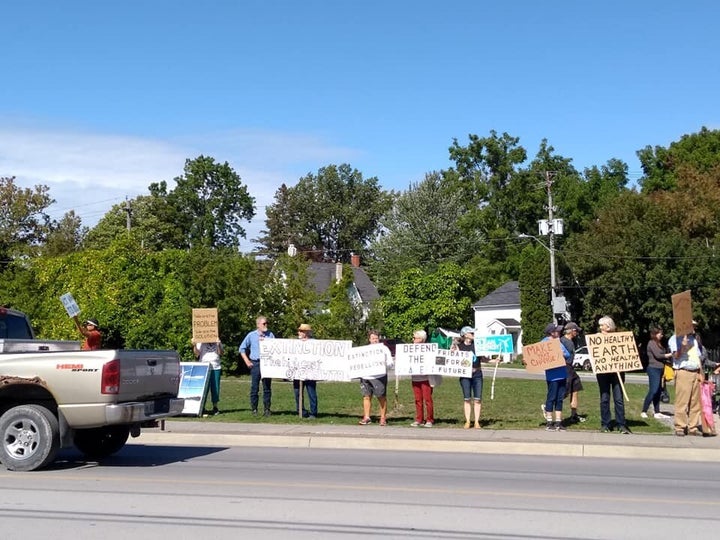 Demonstrators take to Main Street in Picton, Ont. to demand action on climate change on Sept. 27, 2019.