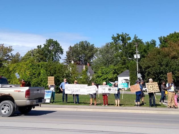 Demonstrators take to Main Street in Picton, Ont. to demand action on climate change on Sept. 27,