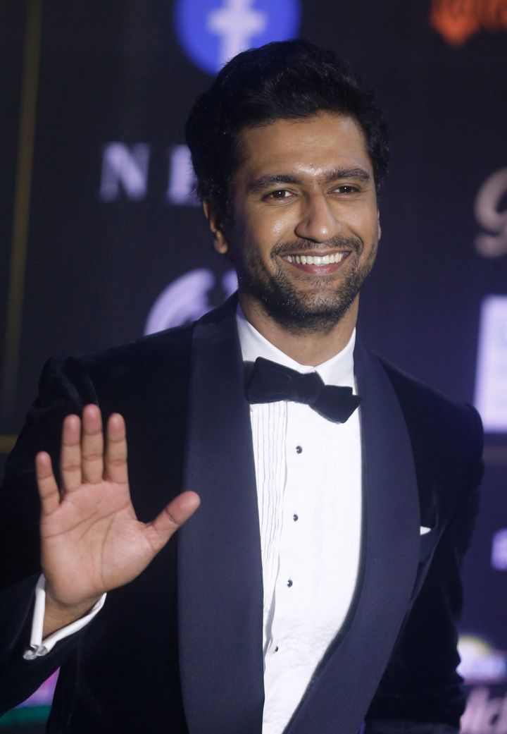 Bollywood actor Vicky Kaushal stands for photographs during the 20th International Indian Film Academy (IIFA) awards ceremony in Mumbai, India, Wednesday, Sept. 18, 2019.(AP Photo/Rafiq Maqbool)