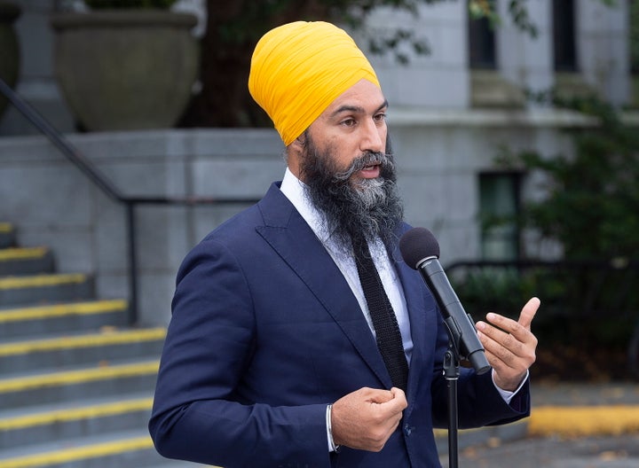 NDP Leader Jagmeet Singh fields questions from reporters after a campaign stop with Mayor Kennedy Stewart at city hall in Vancouver on Wednesday, Sept. 25, 2019. (Andrew Vaughan/The Canadian Press via AP)