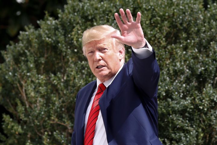 President Donald Trump gestures towards members on the media on the South Lawn of the White House in Washington, Thursday, Sept. 26, 2019, after returning from United Nations General Assembly. 