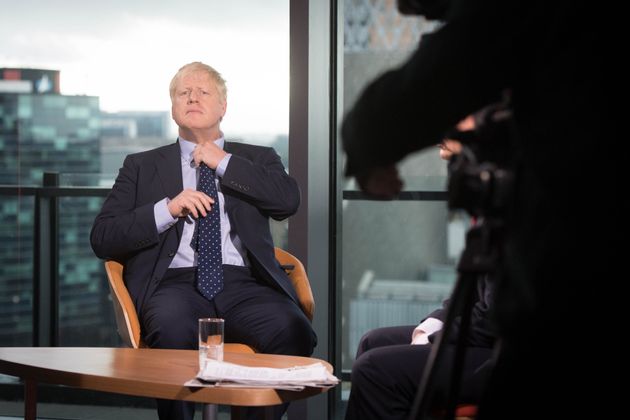 Prime Minister Boris Johnson prepares to appear on the BBC's Andrew Marr show at Media City in Salford before opening the Conservative party annual conference at the Manchester Convention Centre. (Photo by Stefan Rousseau/PA Images via Getty Images)