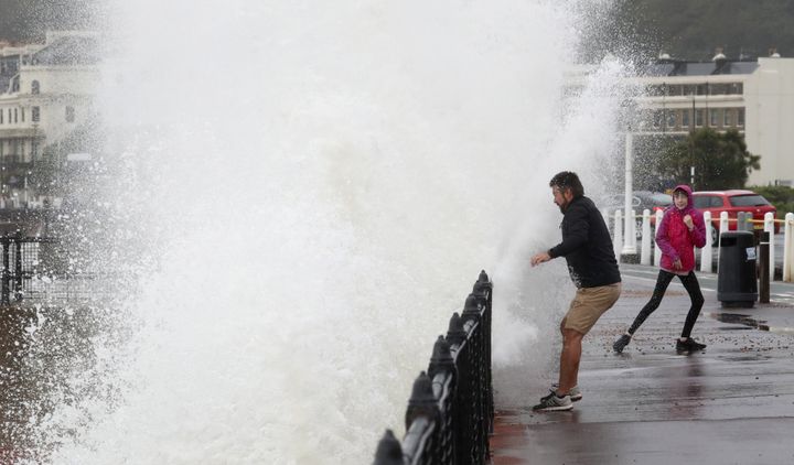 Waves crash over the promenade in Dover, Kent, as forecasters warn that up to 70mm of rain could fall over the highest parts of the country on Sunday.