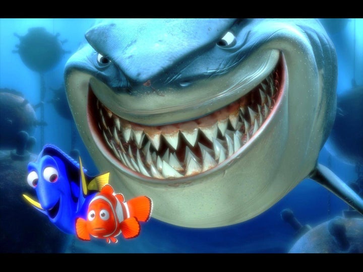 Marlin and Dory with Bruce the shark in scene from movie "Finding Nemo."