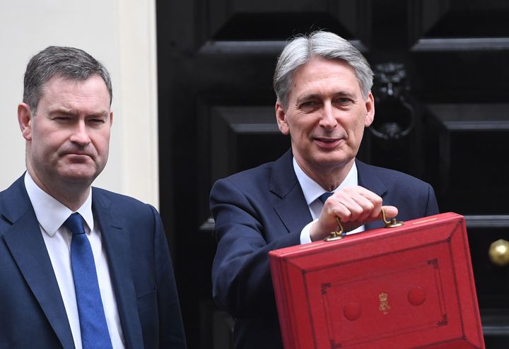 Former cabinet ministers David Gauke (left) and Philip Hammond (right) are leading members of the Tory rebel group who had the party whip removed.