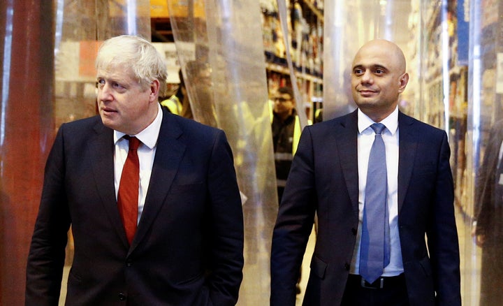 Prime Minister Boris Johnson (left) and the Chancellor of the Exchequer Sajid Javid during a visit to Bestway Wholesale in Manchester.