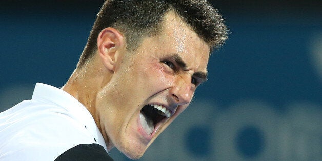 BRISBANE, AUSTRALIA - JANUARY 06: Bernard Tomic of Australia celebrates a point in his match against Radek Stepanek of the Czech Republic during day four of the 2016 Brisbane International at Pat Rafter Arena on January 6, 2016 in Brisbane, Australia. (Photo by Chris Hyde/Getty Images)