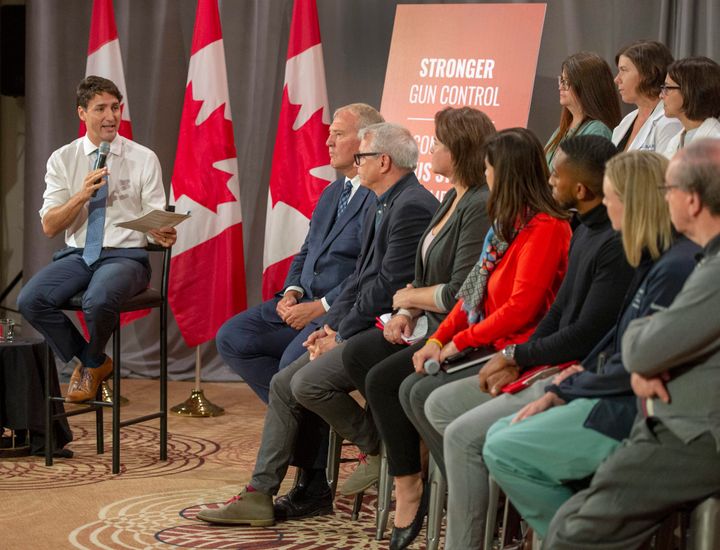 Liberal Leader Justin Trudeau speaks with trauma care workers during a discussion on gun violence gun control on Sept. 30, 2019 in Toronto.
