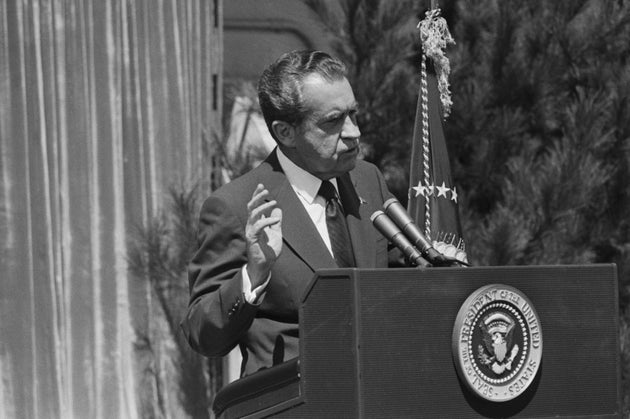 President Nixon in August 1973, conducting the first press conference in nine months, answers one of...