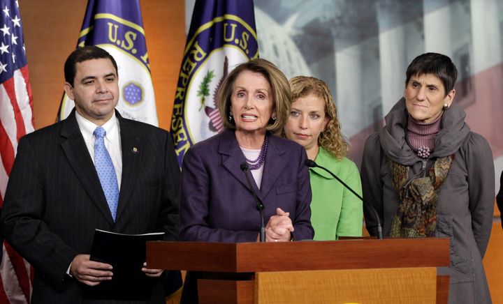 House Speaker Nancy Pelosi (second from left) endorsed Rep. Henry Cuellar of Texas (far left), a conservative-leaning Democrat, in his race for reelection in 2020.