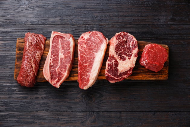 Variety of Raw Black Angus Prime meat steaks Machete, Blade on bone, Striploin, Rib eye, Tenderloin fillet...