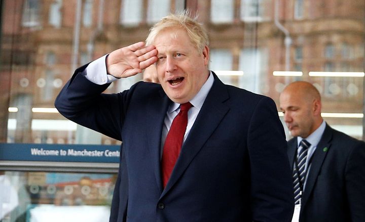 Boris Johnson outside the venue for the Conservative Party annual conference in Manchester. 