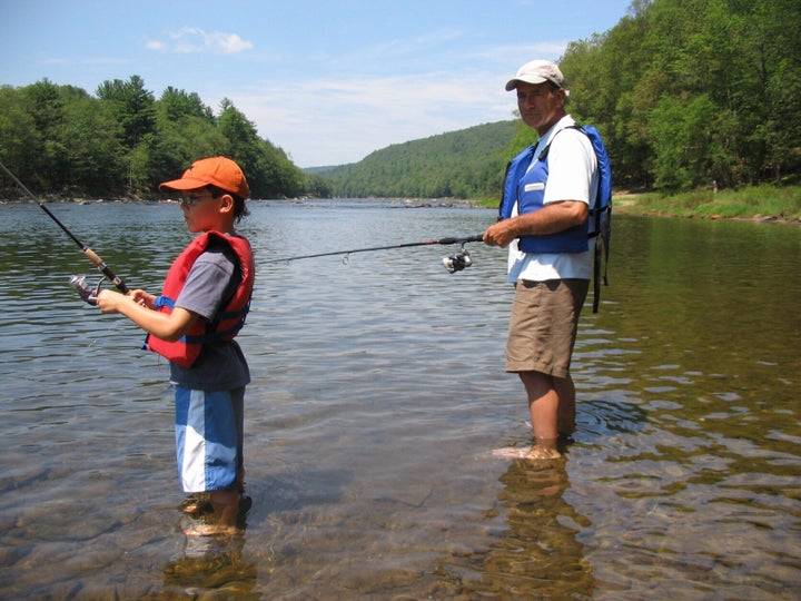 Cameron and his grandad on a fishing trip along the Delaware River in July 2006.