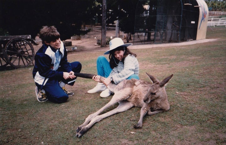 Varnish (right) and her brother Daniel pretending to pull a kangaroo's tail at Brisbane's Lone Pine Sanctuary, Australia during the summer of 1986.