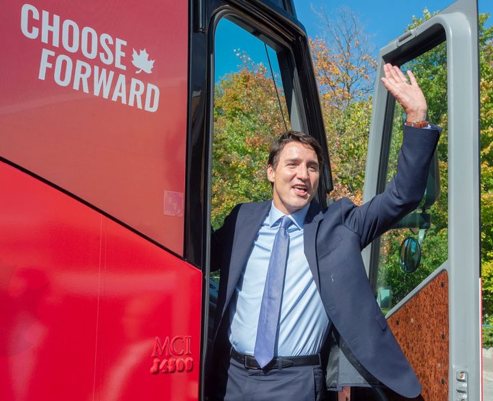 Liberal Leader Justin Trudeau waves to supporters as he boards his campaign bus on Oct. 1, 2019 in Richmond Hill, Ont.